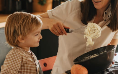 mother cooks with child Mother cooking with child