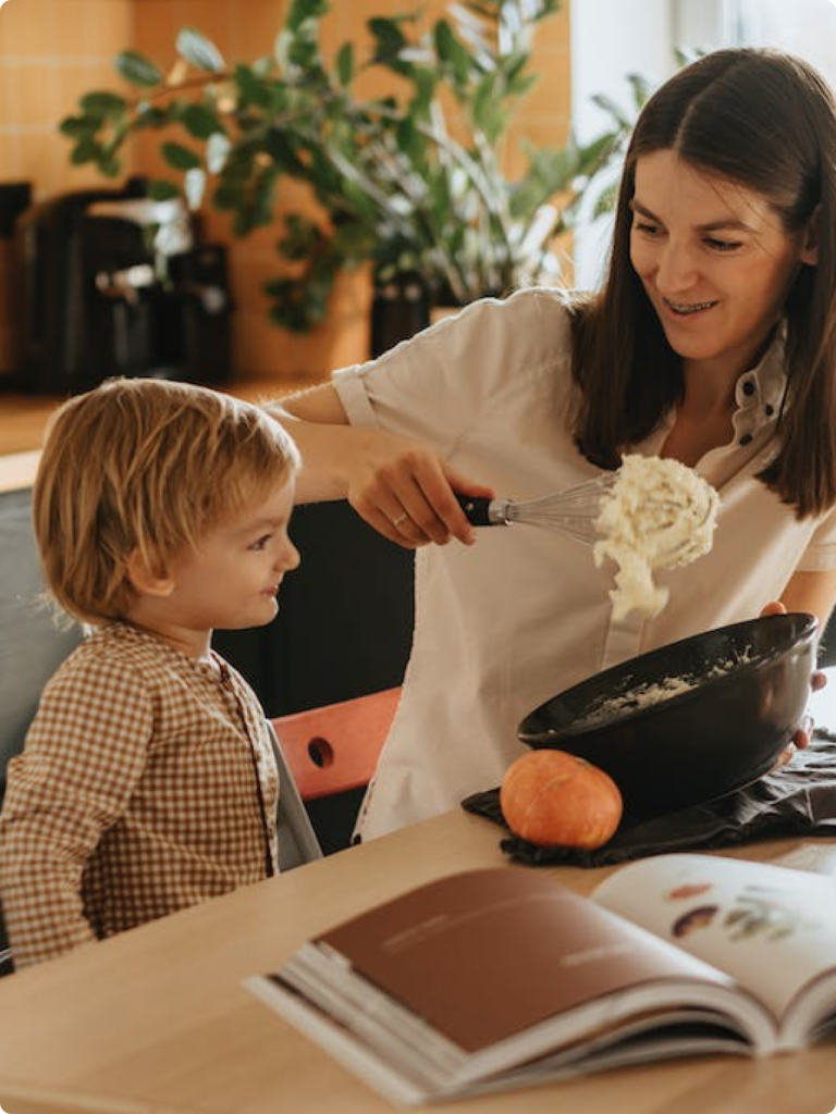Mother cooking with child