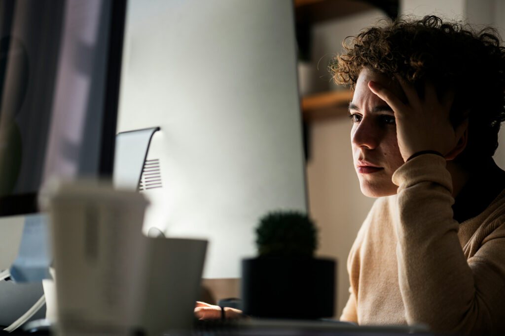 Man holding head trying to remember