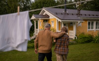 pexels-ron-lach-10397935 Father and son embrace in a hug while walking towards house