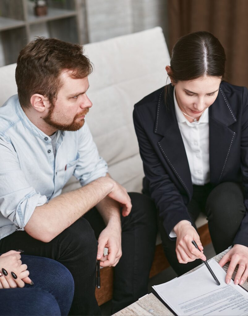 An attorney reviewing legal documents with a client after a traumatic brain injury