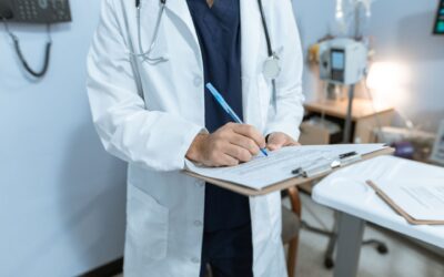 pexels-rdne-stock-project-6129043 Doctor writing on a medical chart, representing documentation of care in a medical negligence case